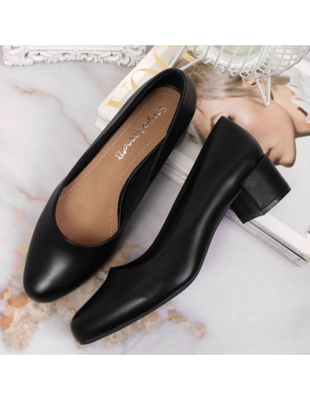 Black Pumps on a block from W Sergio Leone