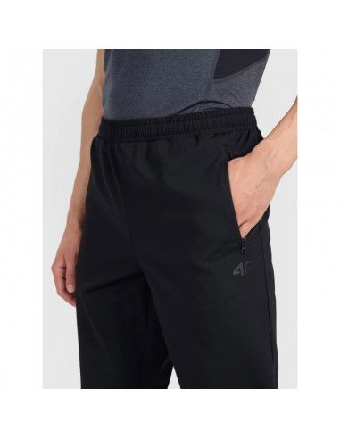 Men's quickdrying training pants 4F...